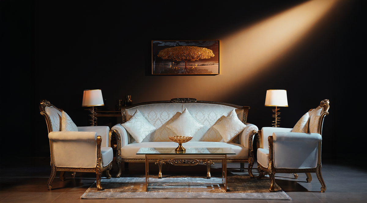 PFI sofa and armchairs in a dark, warmly lit living room